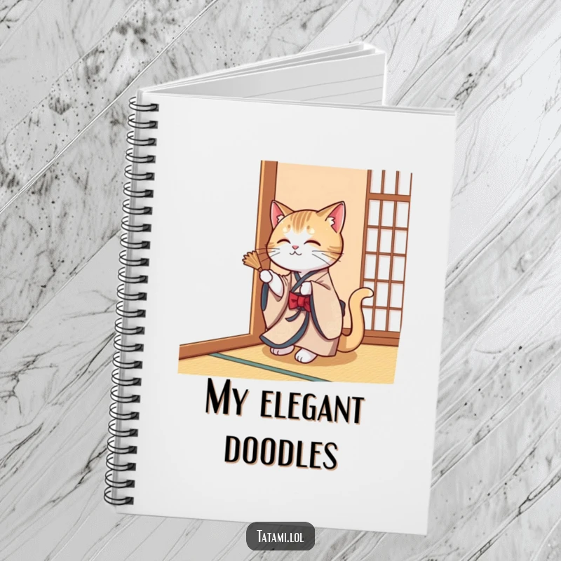 Funny cat in a kimono, playfully swatting a tatami mat corner, on the cover of a notebook.