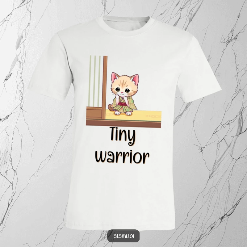 Funny cute kitten wearing a tiny kimono, playfully batting a tatami mat corner, featured on a t-shirt.